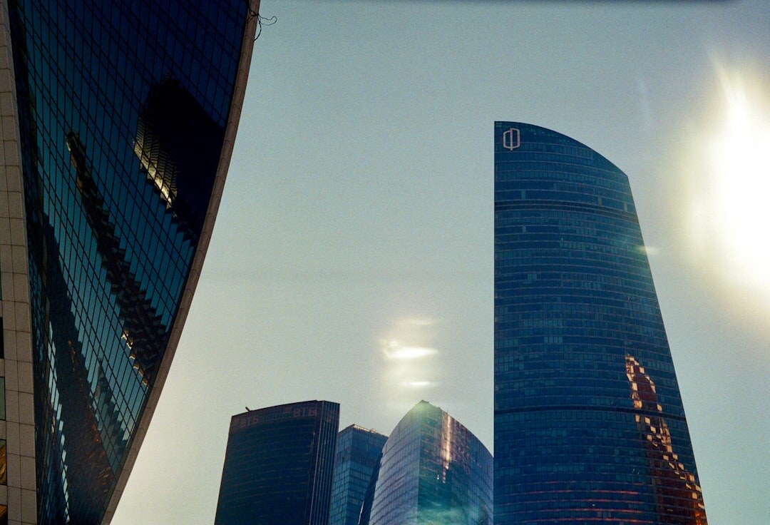 Modern financial district skyline with glass office towers