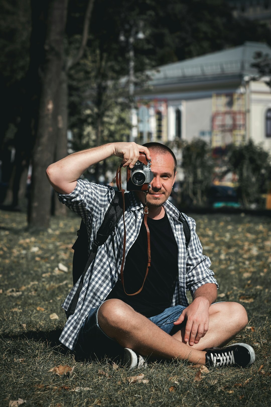 Studio portrait of a Swiss man in his thirties with glasses